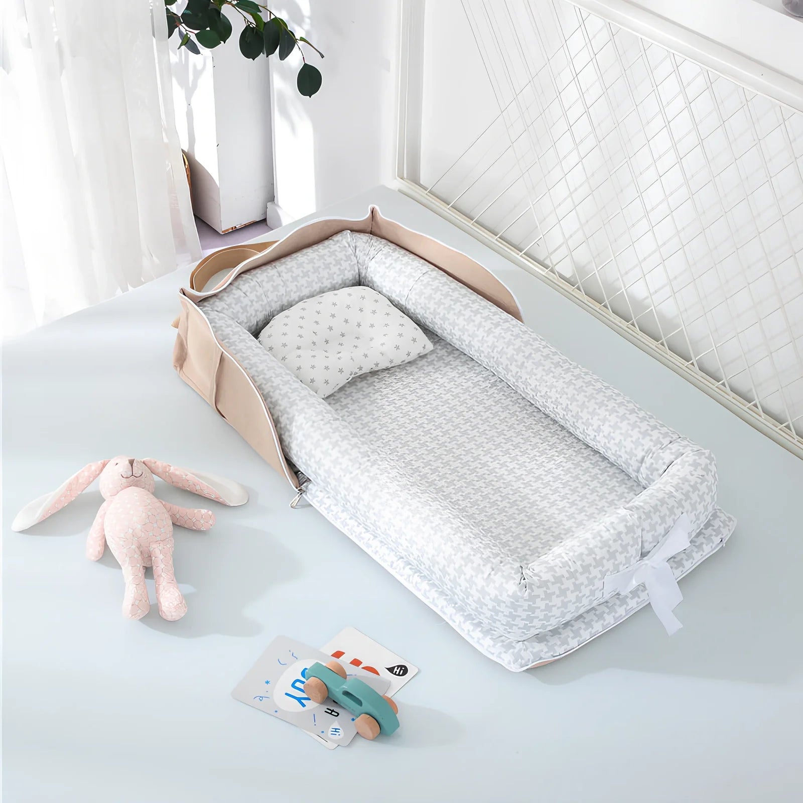 Foldable cotton portable baby crib in Animal World Blue, 90x50 cm with pillow and strap, weighing 1.3 kg