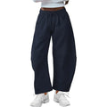 Loose cropped sports sweatpants with elastic waistband and drawstring pockets in street fashion style