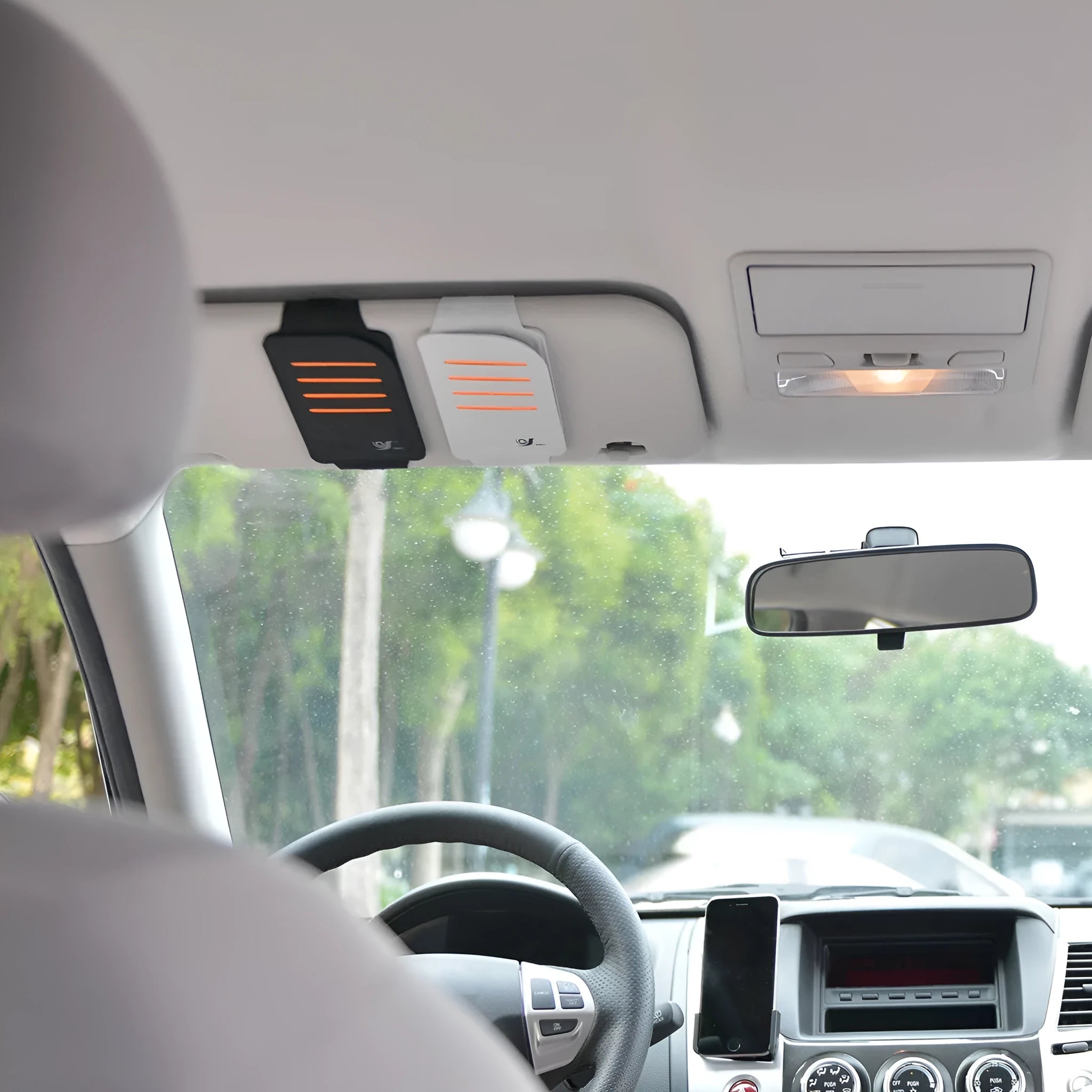 Car sun visor set showing four shading panels and a vehicle-mounted storage bag.