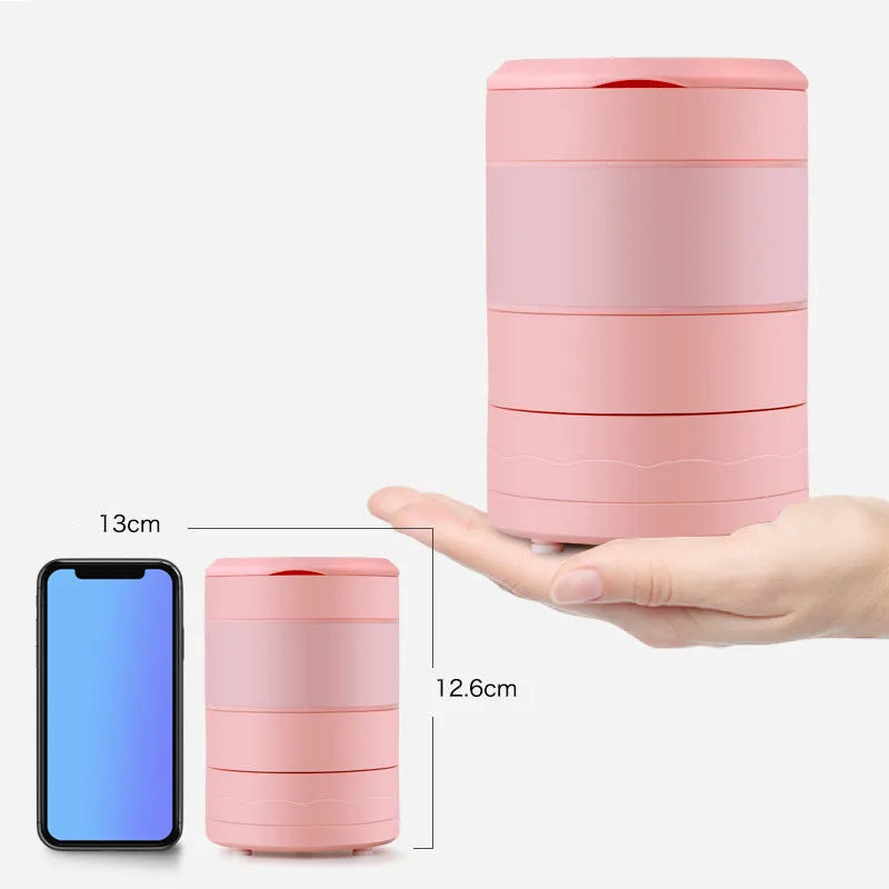 Blue mini portable blender with stainless steel blades, shown extended and folded next to a USB cable.