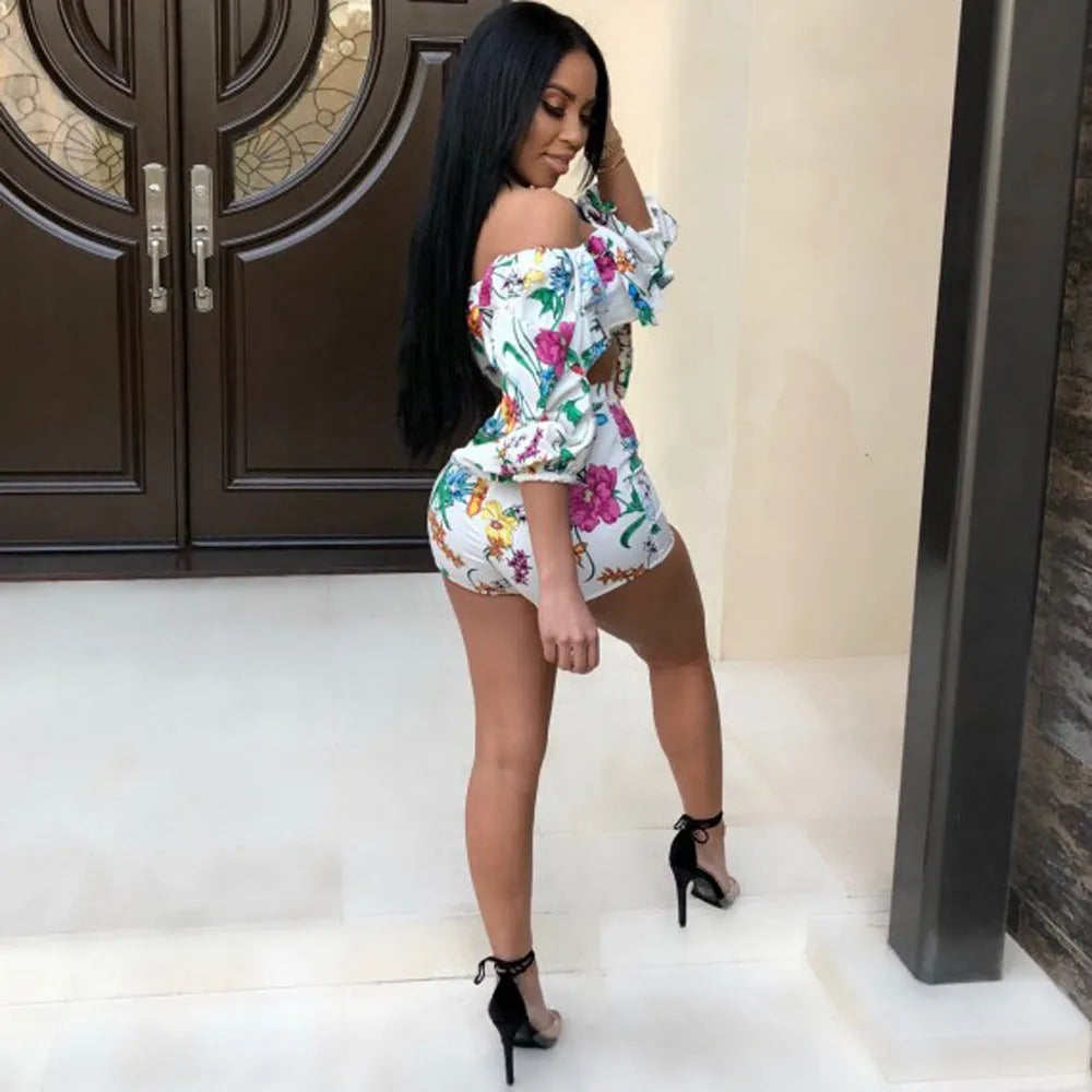 Women's multicolour digital print two-piece playsuit with fluffy pile sleeves and matching shorts.
