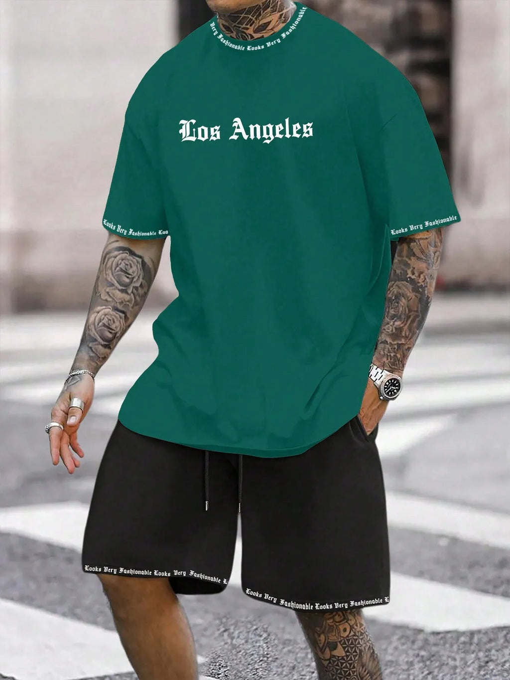 Men's sports style short-sleeved suit set with matching shorts in polyester blend fabric