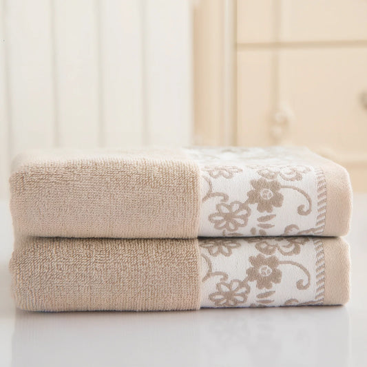 Creamy white wisteria flower jacquard cotton towel, 32 ply absorbent, 34x73cm dimensions