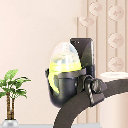 Universal baby stroller cup holder with phone pocket attached to a stroller