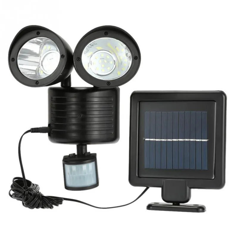 Black and white solar security spotlight with dual motion sensors for outdoor use