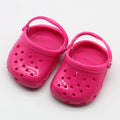 Colourful plastic doll beach slippers accessory in blue, red, yellow, green