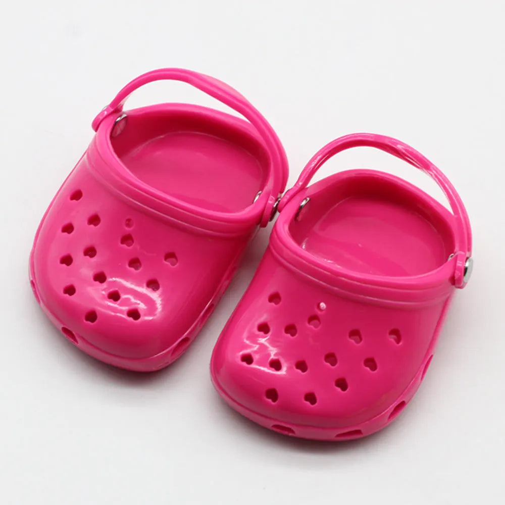 Colourful plastic doll beach slippers accessory in blue, red, yellow, green