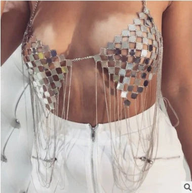 Women's golden and silver metal bra chain with tassel detail, adjustable for a perfect fit