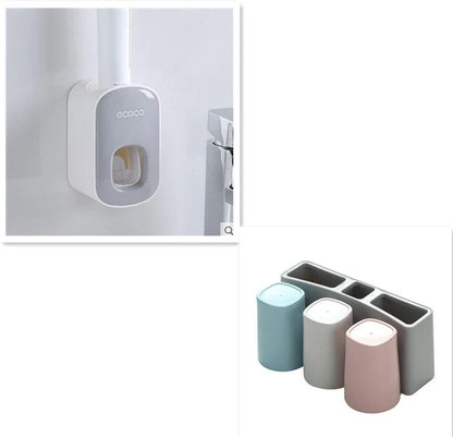 Wall-mounted automatic toothpaste dispenser with upside-down mouthwash cup for convenient and hygienic bathroom organization