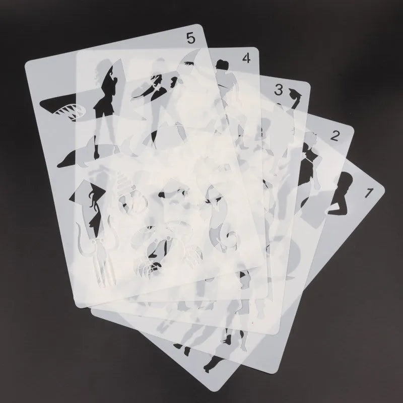White plastic drawing stencils showing multiple style options for craft and pattern projects