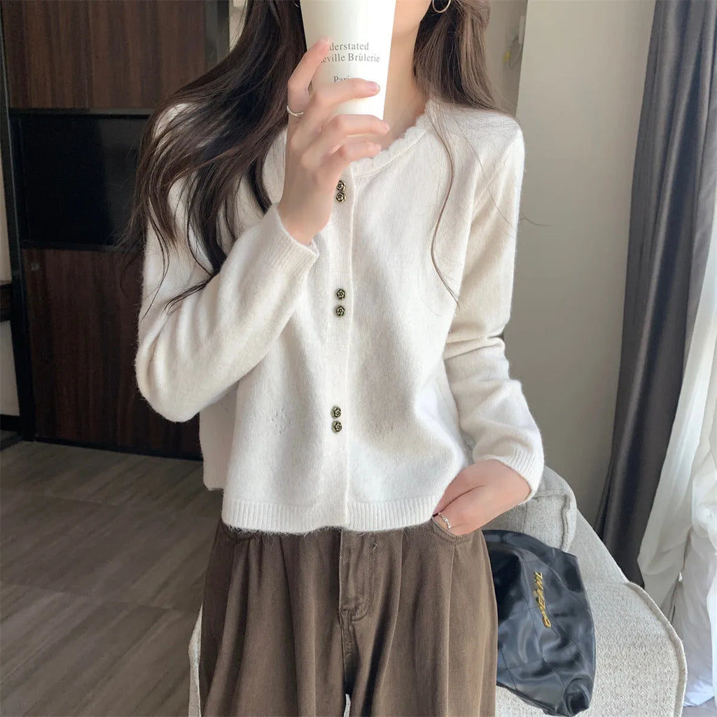 Women's long-sleeved acrylic cardigan coat in milky white, available in four other colours.
