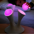 Decorative mushroom lamp with colourful LED gradient glow on bedside table, 21.5cm height