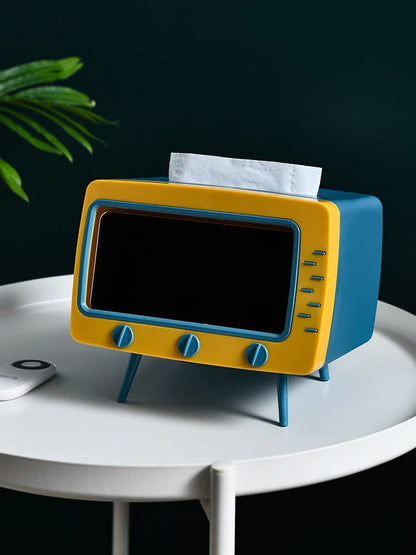 Creative cartoon-themed plastic tissue box with mobile phone slot in various colours