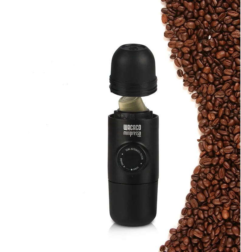 Black portable manual espresso maker showing compact 17.5cm height and 6cm diameter.