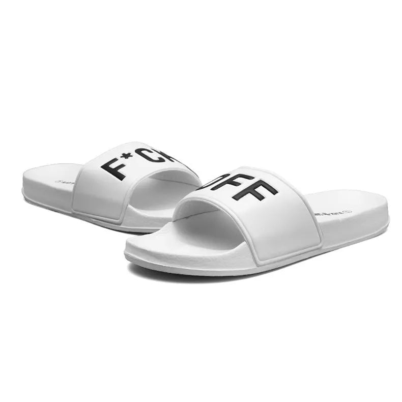 A pair of large men's open-toe slippers with a rubber sole, shown in black.