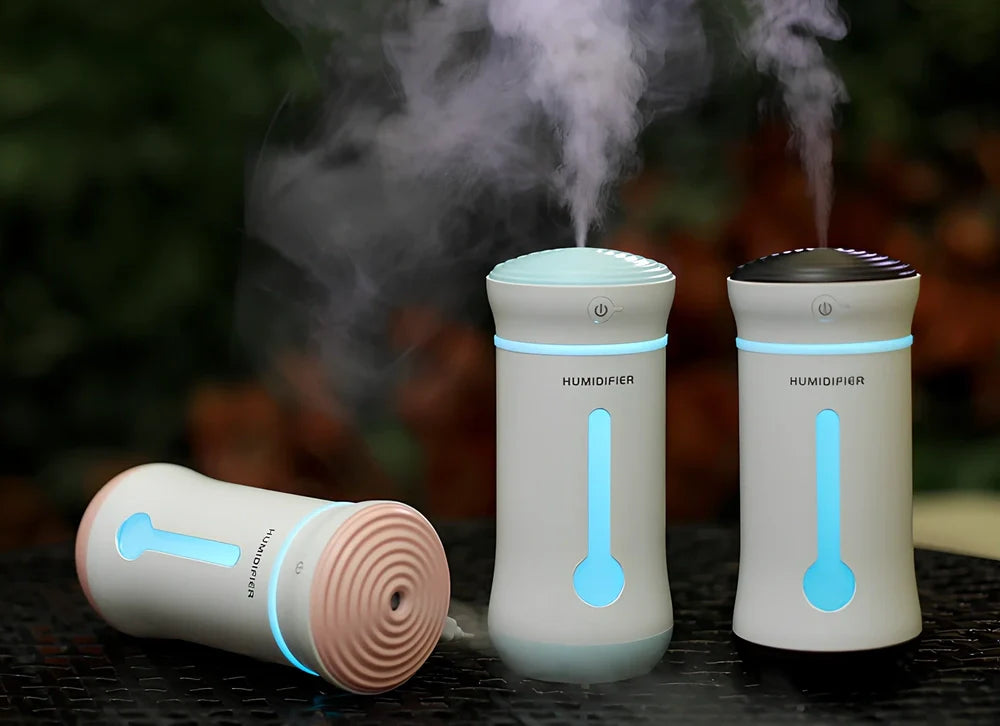 Creative car air purifier humidifier in pink, 7.6x7.6x17cm size with 300ml bottle and USB cable