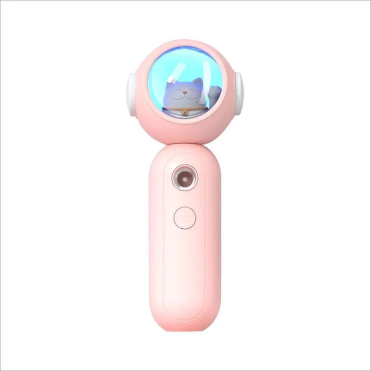 Handheld nano spray steamer in cat pink, cat white, and alien red for skin hydration