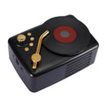 T12 compact Bluetooth record player with vinyl turntable, dual speakers, and wireless streaming in a black finish