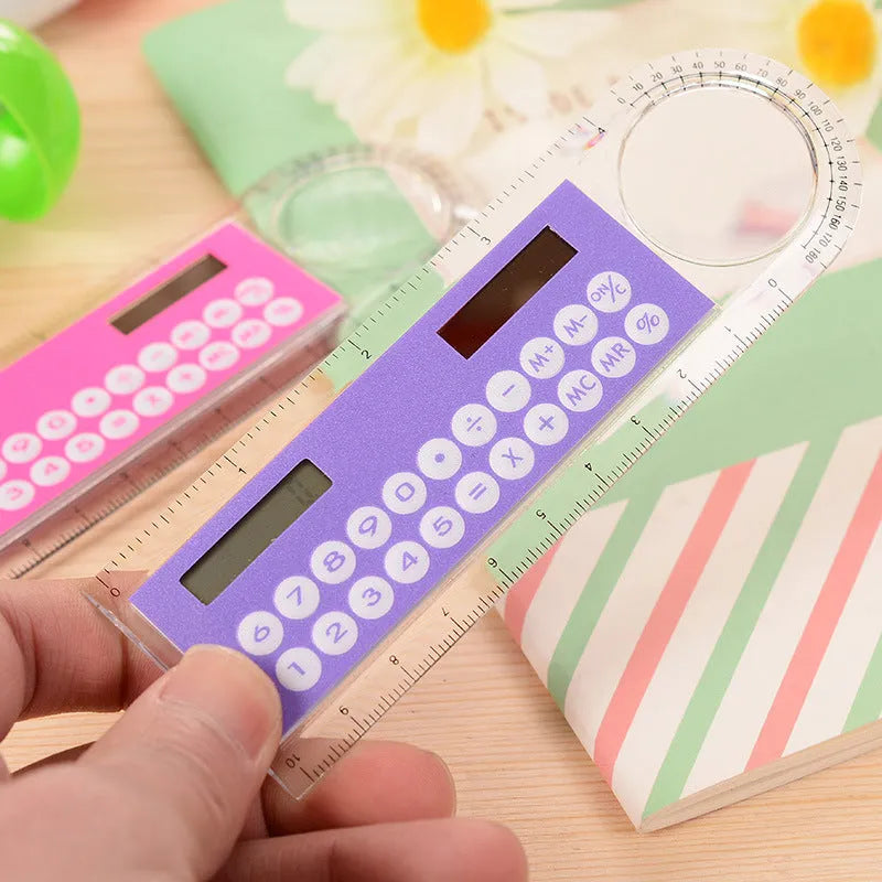 Solar powered mini ruler calculator with transparent touchscreen screen and 8-digit display on a white background