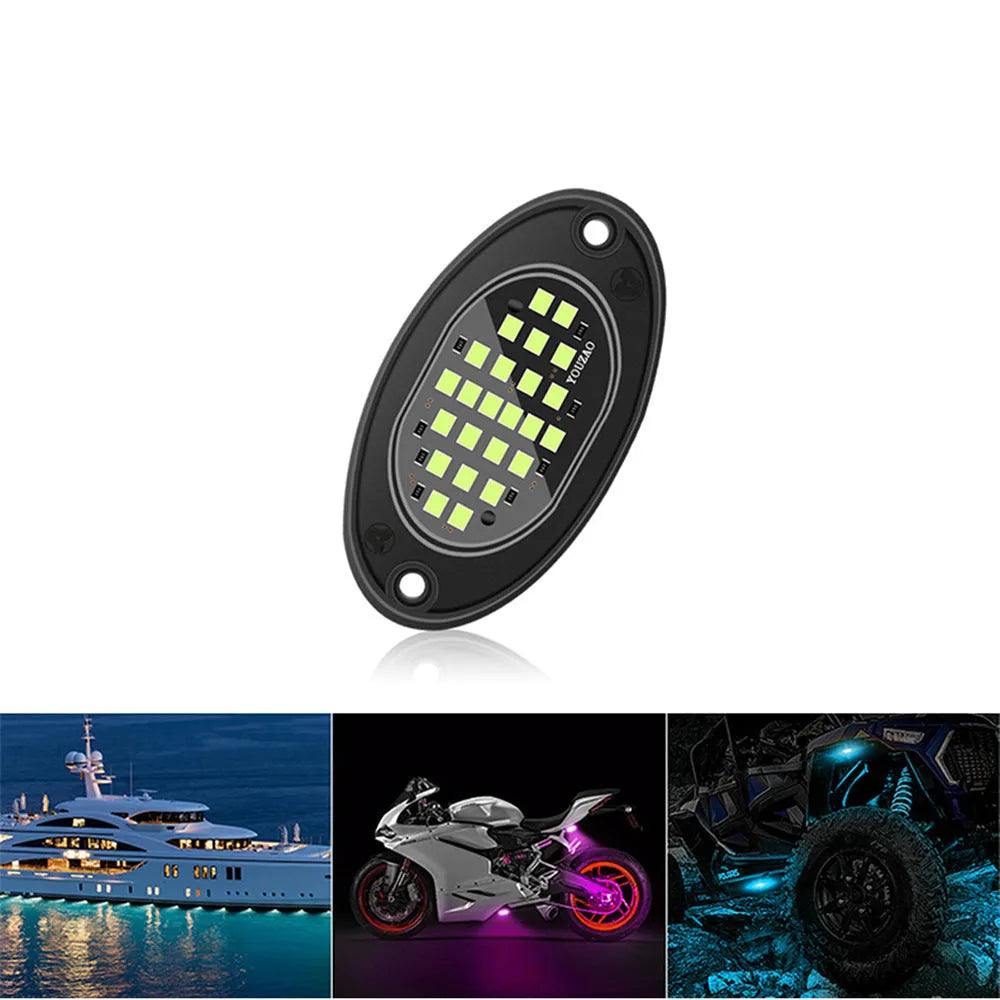 12V car LED chassis ambience light in ABS housing with five colour options on a dark vehicle underside