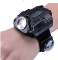 Black LED watch flashlight with time display and compass on wristband for outdoor use