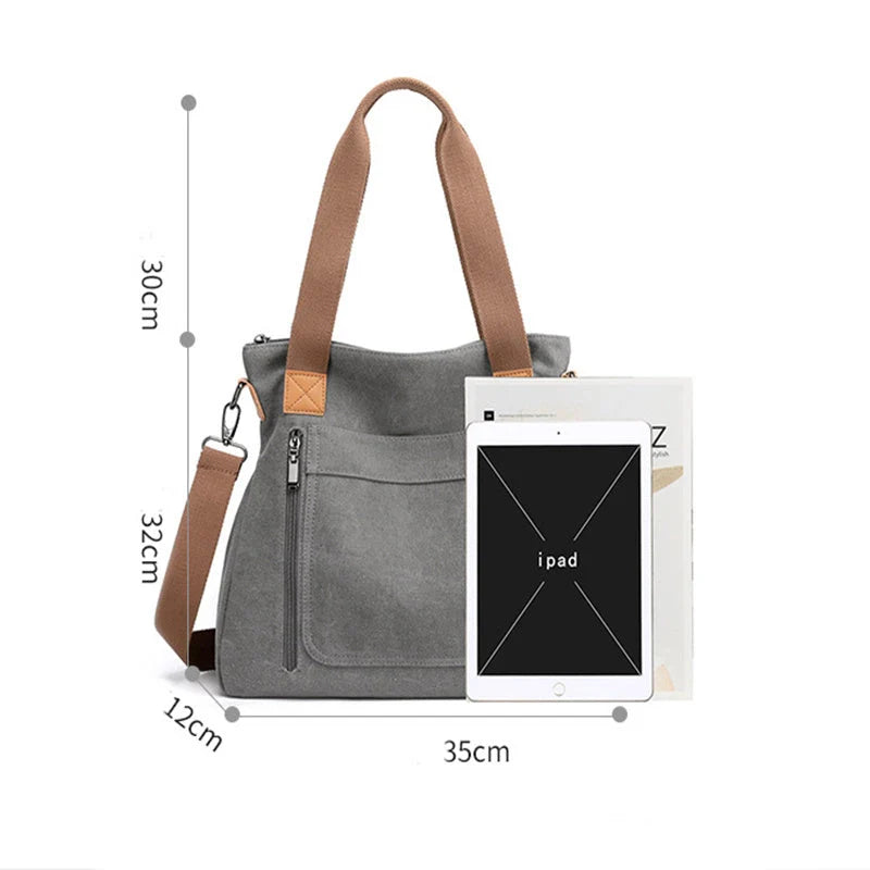 Women's canvas shoulder bag in multiple colours, showcasing spacious interior and zipper closure.