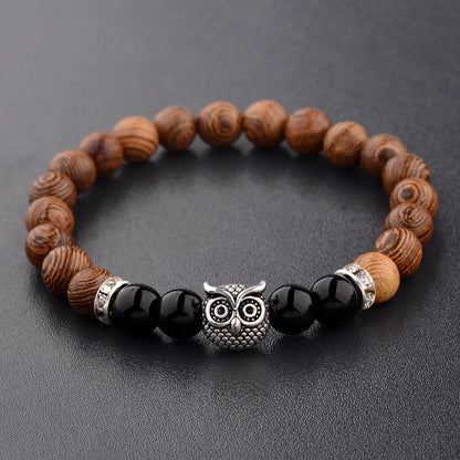Owl frosted stone lifeline wood grain bracelet in black and gold, adjustable for a perfect fit