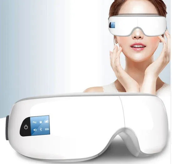Bluetooth music eye massager in pearl white with air pressure hot compress, featuring foldable leather case