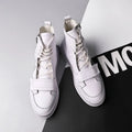 Men's black and white PU leather winter ankle boots in high-top sneaker style with microfiber upper