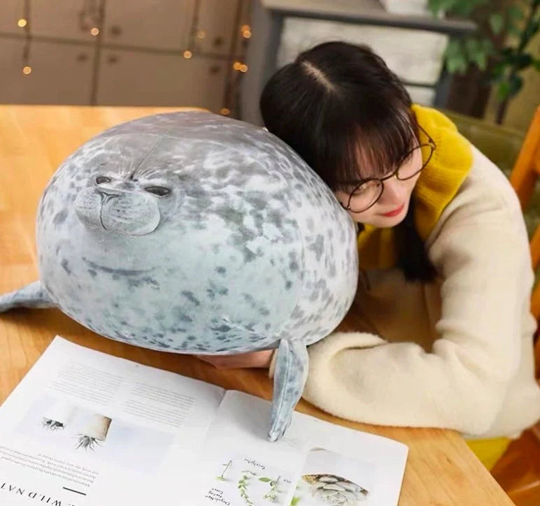 Large grey and white seal plush toy in various sizes for decoration and cuddling