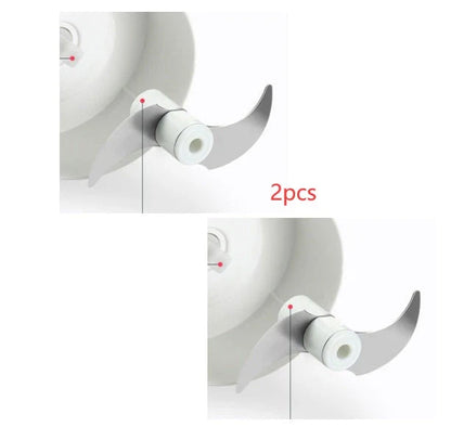 Manual cutting meat grinder with stainless steel blades on a kitchen counter