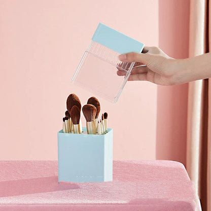 Inverted makeup brush storage bucket in white, blue, and pink for organised dressing tables
