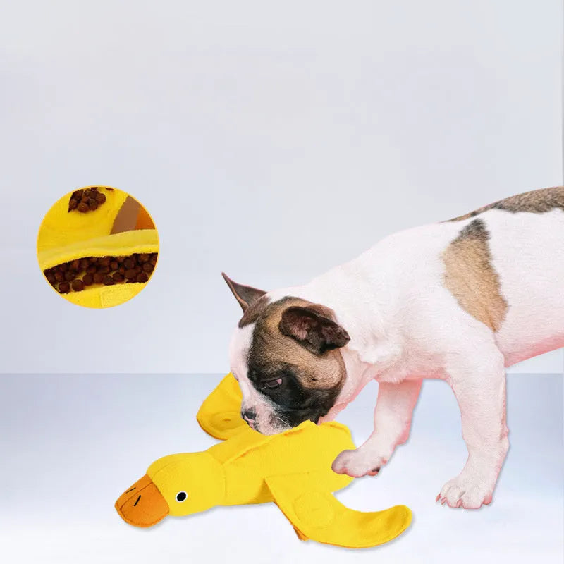 Yellow teddy dog toy with duck doll attachment for training with sounds and food leaks