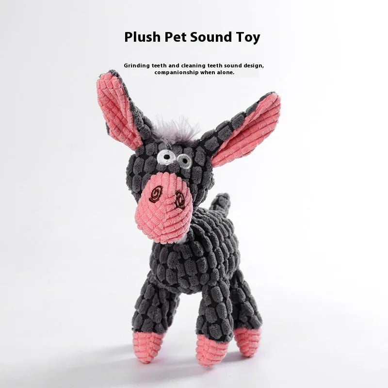 Assorted plush pet toys including a grey donkey, a beige donkey, and a yellow rechargeable duck for puppies.