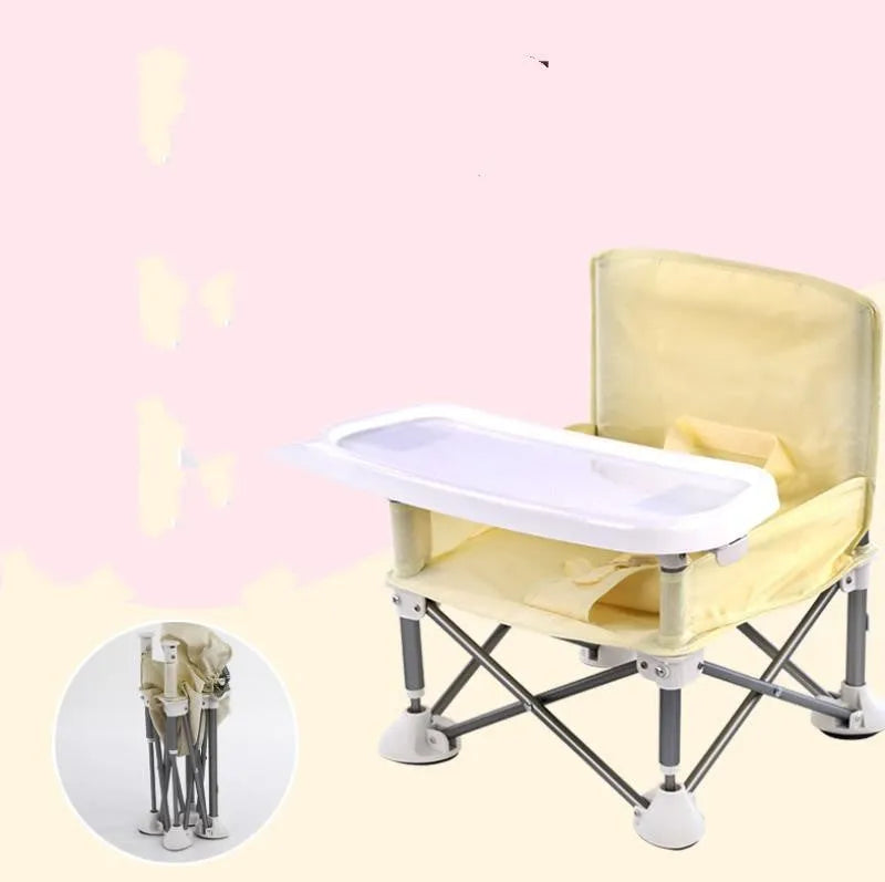 Foldable baby dining chair in folding grey with removable tray and safety belt, includes storage bag