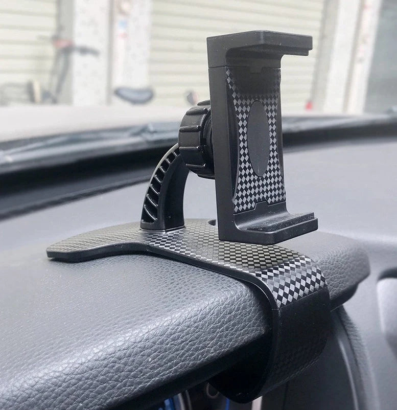 Dashboard-mounted car phone holder with adjustable ball head and stretchable silicone clip for conventional smartphones
