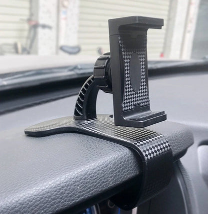 Dashboard-mounted car phone holder with adjustable ball head and stretchable silicone clip for conventional smartphones