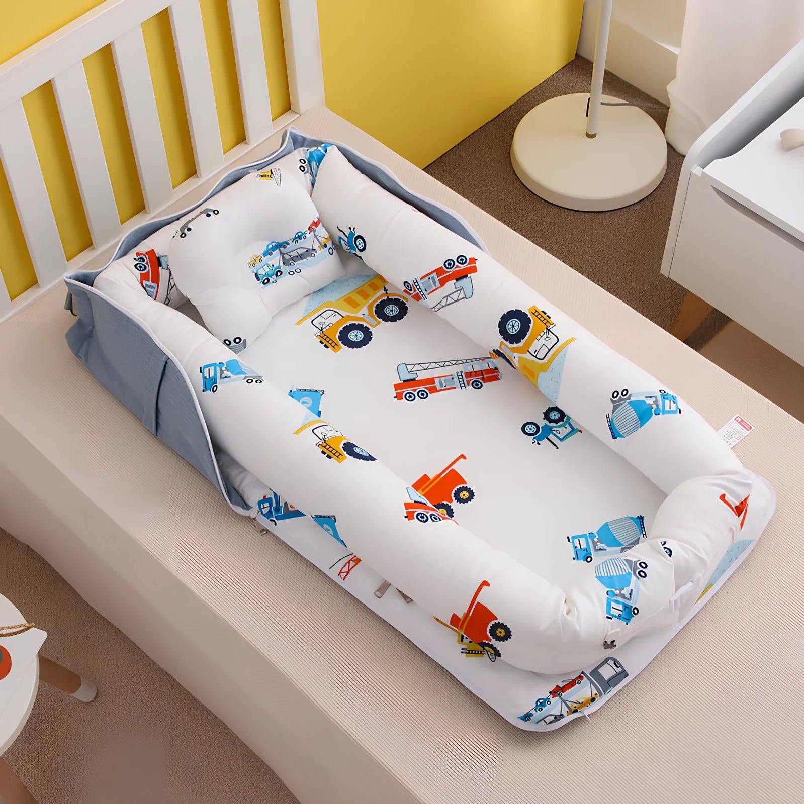 Foldable cotton portable baby crib in Animal World Blue, 90x50 cm with pillow and strap, weighing 1.3 kg
