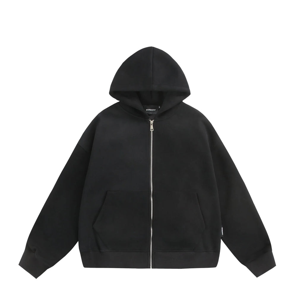 Cotton blend loose fit cardigan coat with a small bag on the back, shown in black.