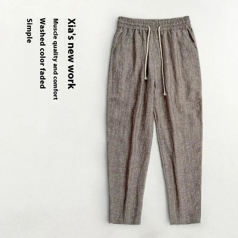 Men's thin cotton linen casual trousers in a cropped length, shown in a striped pattern.