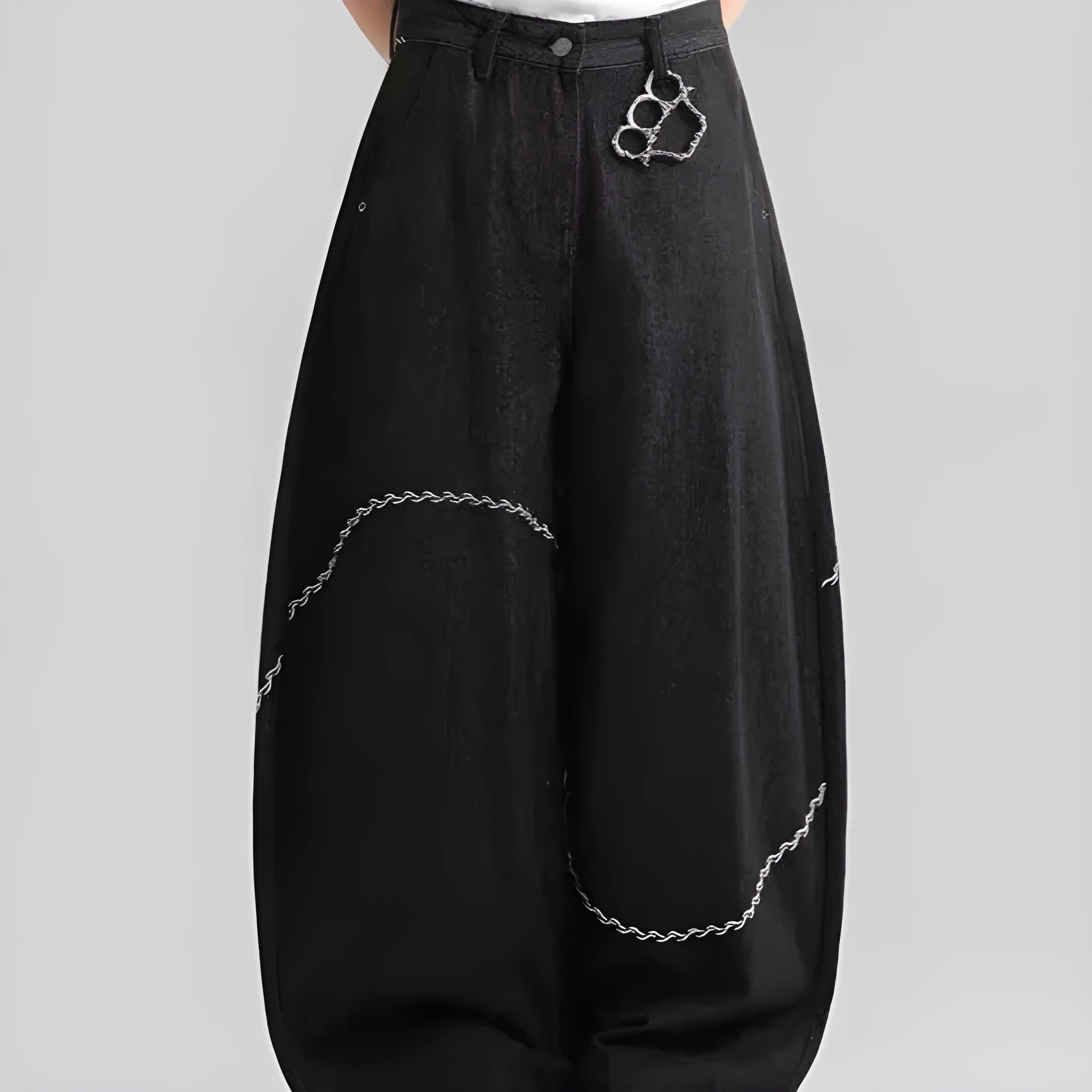 Black straight-leg polyester denim trousers with a zip fly and micro-elastic waistband.