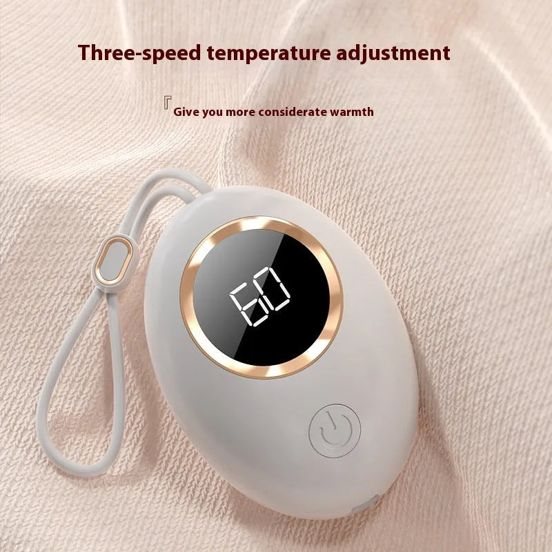 USB rechargeable hand warmer with digital display shown in pink, blue, green, and white colour options.
