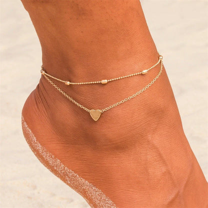 Double-layered anklet with retro beach ball chain and heart-shaped charm in gold and silver