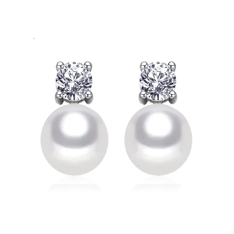 Round pearl stud earrings in silver with 8-9mm pearls, elegant and timeless