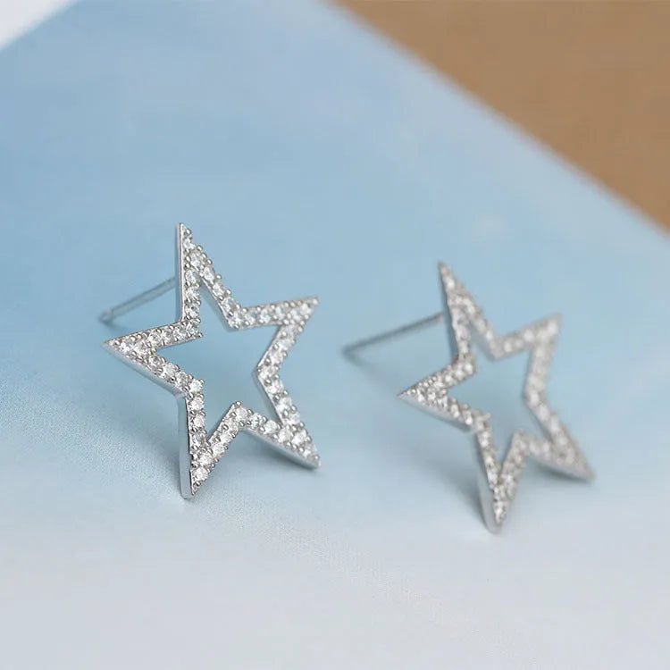 S925 sterling silver micro-inlaid five-pointed star stud earrings, Korean style, for women on a white background