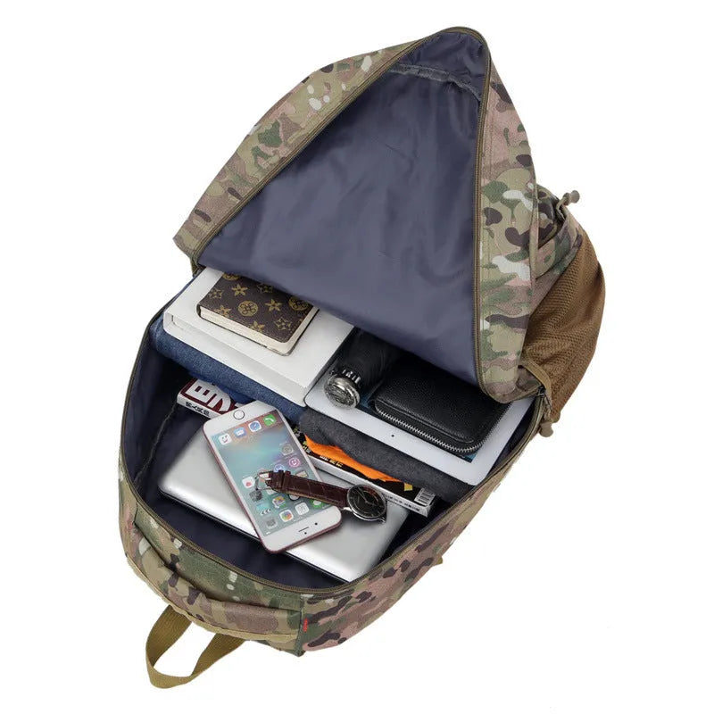50L camouflage outdoor mountaineering backpack with Oxford cloth construction on rocky terrain