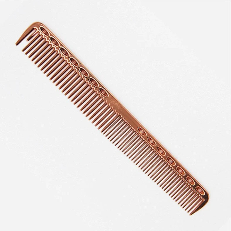 Space aluminium haircut comb in rose gold finish showing precise tooth spacing and polished metal surface