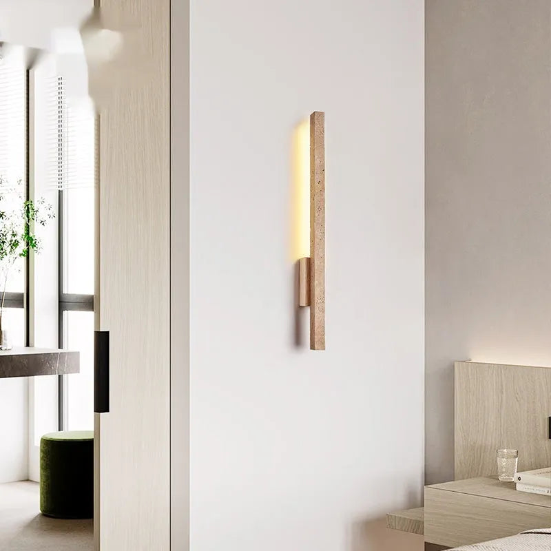 Minimalist strip wall lamp with warm light, cave stone base, black wood colour finish, 55cm length
