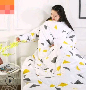 Cozy fleece-lined blanket with sleeves in various colors and designs, providing warmth and comfort for cold weather use.