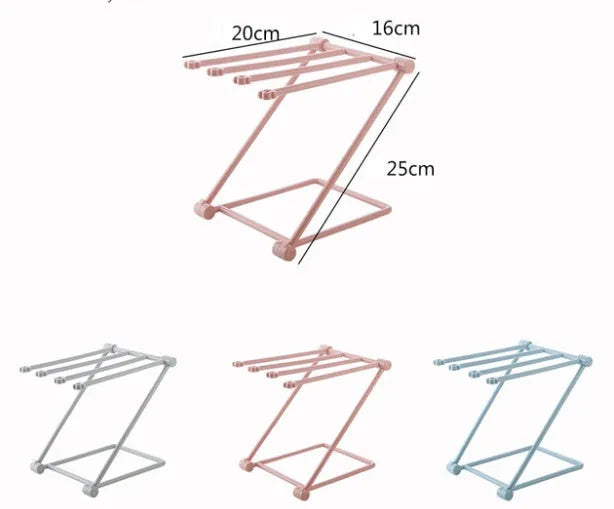 Foldable plastic dishcloth shelf in Nordic colours for kitchen bottle storage